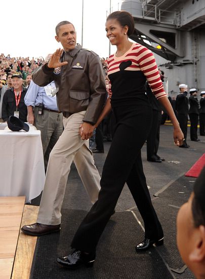 Барак и Мишел Обама, хванати за ръка