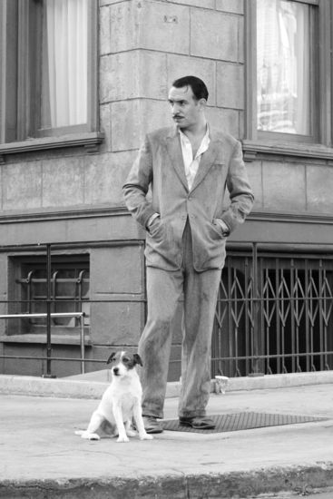 Жан Дюжарден с кучето Уги