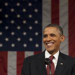Барак Обама на фона на американското знаме