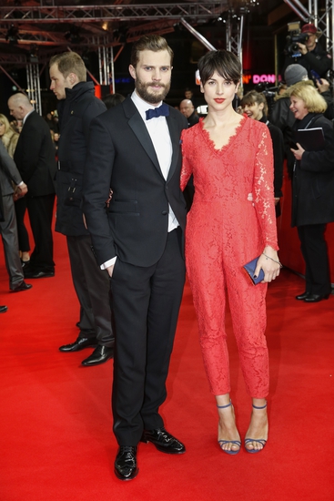 Джейми Дорнан с жена си на Берлинале