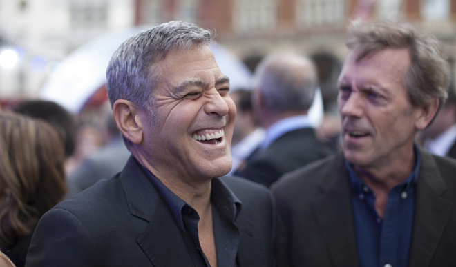 Джордж Клуни демонстрира холивудските си зъби