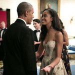 Барак Обама с първородната си дъщеря Малия