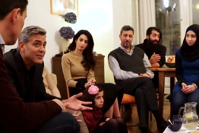Джордж Клуни и Амал със сирийски бежанци в Берлин