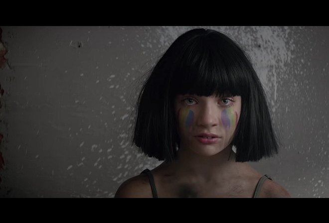 Маги Зиглър в клипа на Сия The Greatest