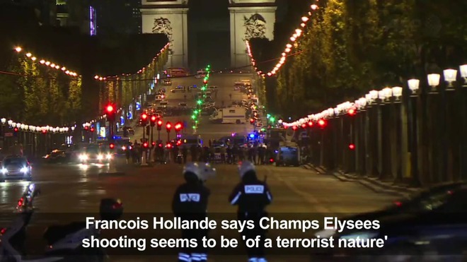 France president says Paris shooting suspected terror attack